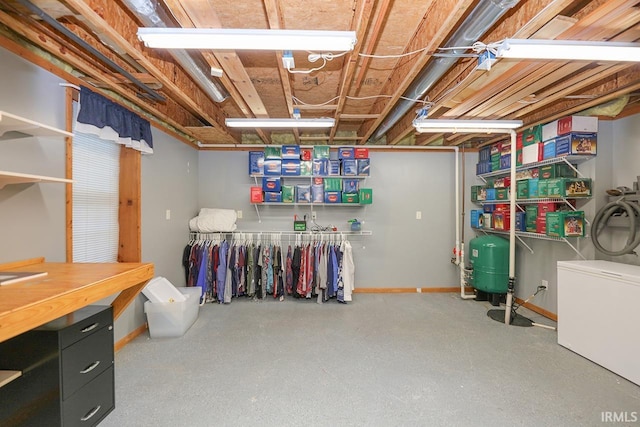 29876 County Road 18th Rd, Elkhart, IN 46517 - unfinished basement featuring a water pressure tank and fridge