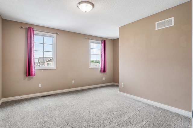 625 Perolla Dr, Fort Wayne, IN 46845 - unfurnished room with carpet floors, healthy amount of natural light, and a textured ceiling