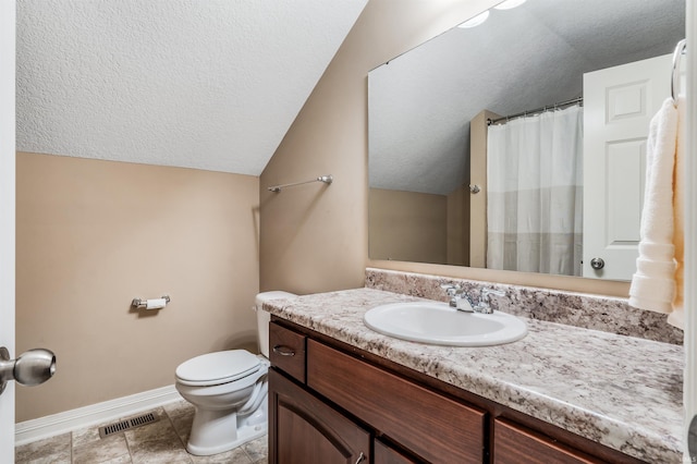 625 Perolla Dr, Fort Wayne, IN 46845 - bathroom with lofted ceiling, a textured ceiling, and vanity