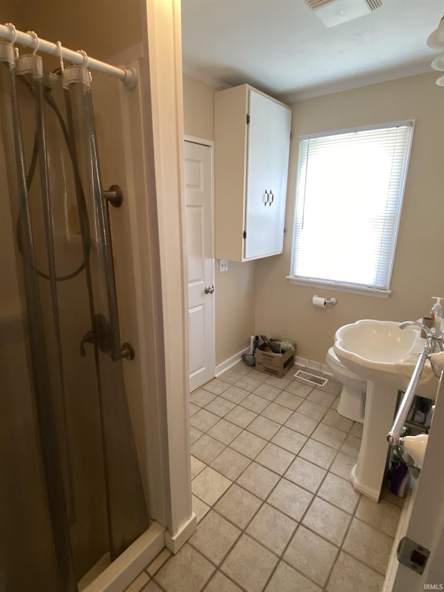 401 College Ave, Winona Lake, IN 46590 - full bath featuring a shower stall and tile patterned flooring