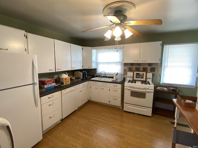 401 College Ave, Winona Lake, IN 46590 - kitchen featuring white appliances, a ceiling fan, white cabinets, and dark countertops