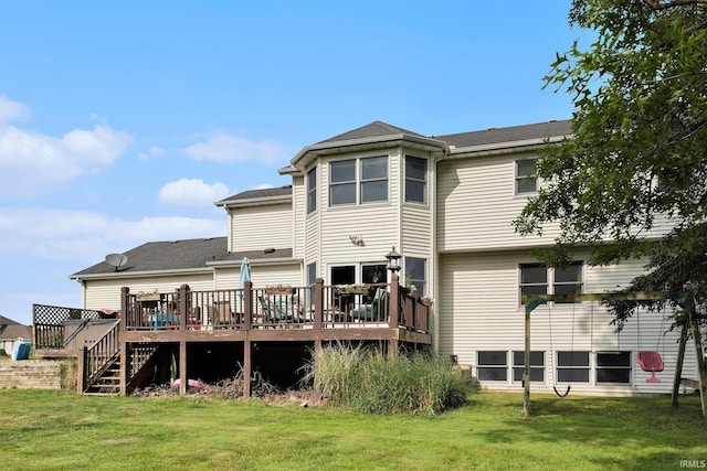 53135 W Cedar Lake Dr, Granger, IN 46530 - back of house featuring a deck and a lawn