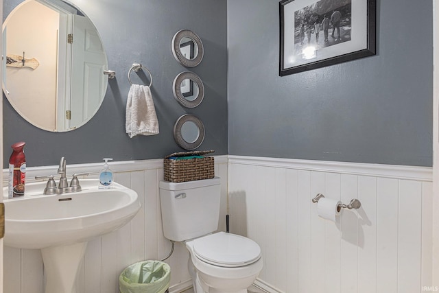 53135 W Cedar Lake Dr, Granger, IN 46530 - half bath featuring a wainscoted wall