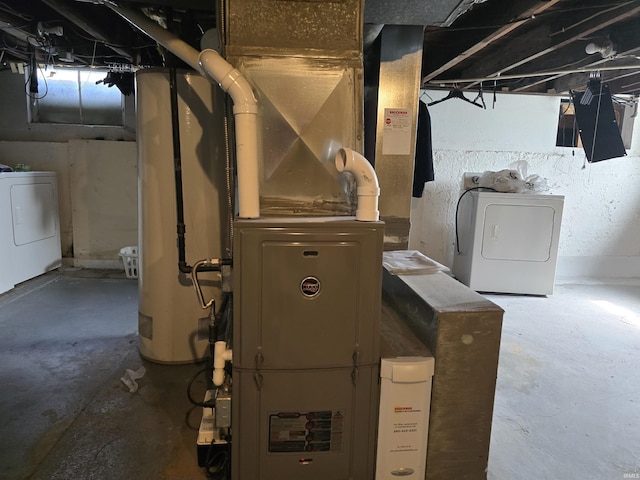 732 Dowling St, Kendallville, IN 46755 - utility room featuring washer / dryer and heating unit
