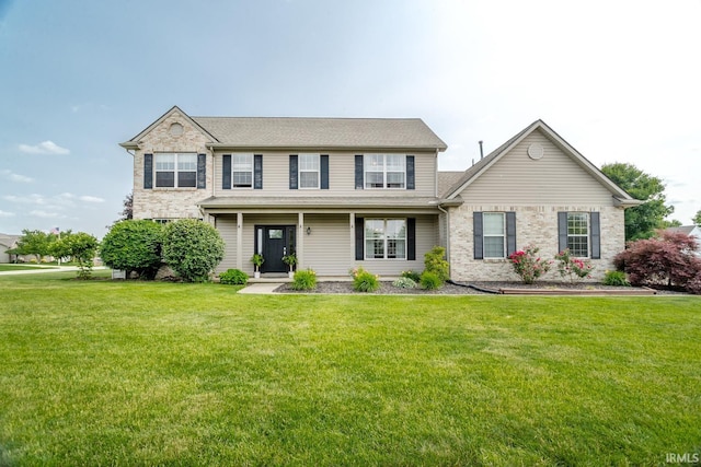 2007 Kingfisher Dr, Lafayette, IN 47909 - view of front of home featuring a front lawn and a porch