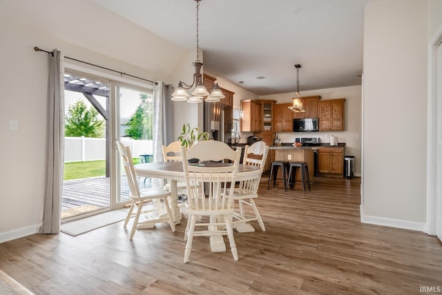 2007 Kingfisher Dr, Lafayette, IN 47909 - dining space featuring light wood-style flooring and a chandelier