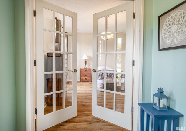 2007 Kingfisher Dr, Lafayette, IN 47909 - doorway with french doors and wood finished floors