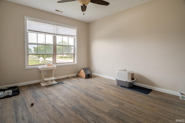 2007 Kingfisher Dr, Lafayette, IN 47909 - unfurnished room featuring a ceiling fan, wood finished floors, and a textured ceiling
