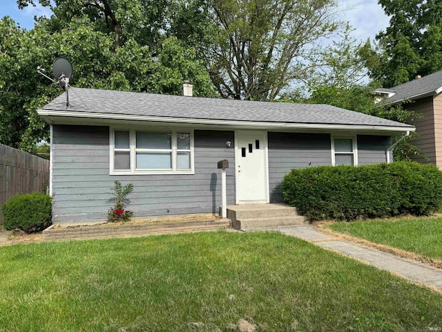 4320 Warsaw St, Fort Wayne, IN 46806 - view of front facade with roof with shingles and a chimney