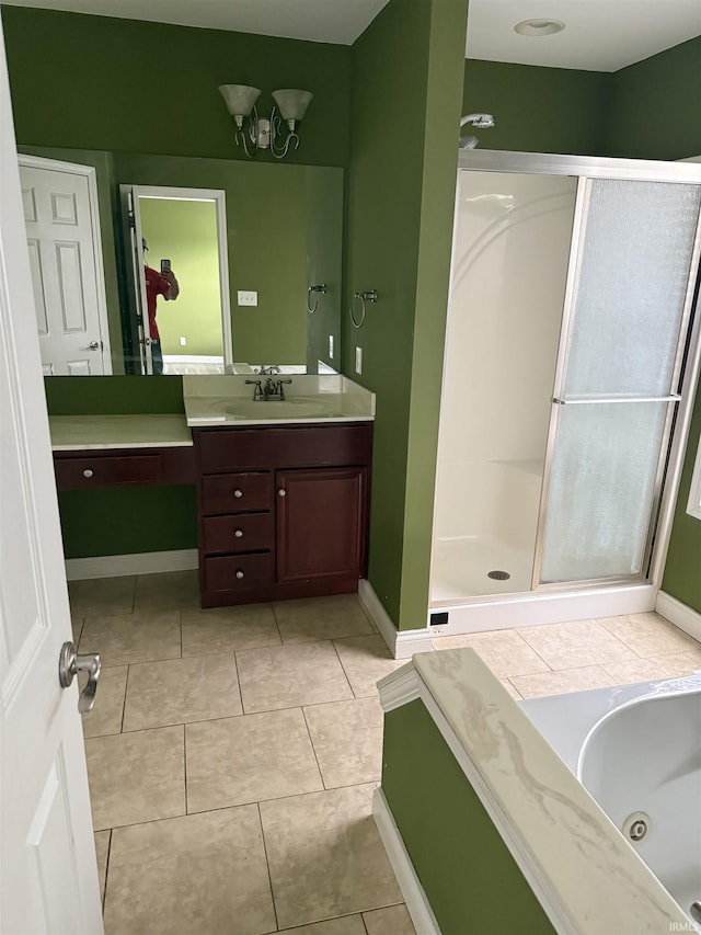 5450 Fox Chase Ct, Boonville, IN 47601 - full bathroom featuring vanity, a stall shower, a jetted tub, and tile patterned floors