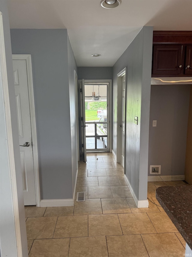5450 Fox Chase Ct, Boonville, IN 47601 - hall featuring baseboards and light tile patterned flooring