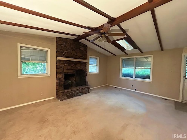 814 W 11th St, Bloomington, IN 47404 - unfurnished living room with a ceiling fan, a fireplace, and carpet flooring