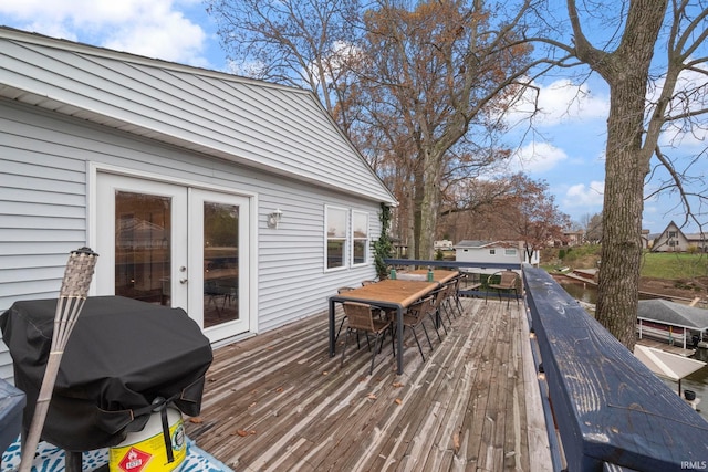 2770 N Baers Ct, Monticello, IN 47960 - deck with outdoor dining area and grilling area
