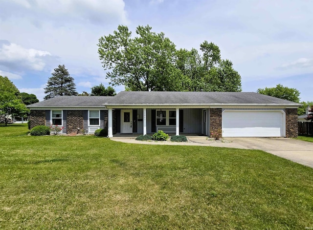 1003 Crestview Dr, Angola, IN 46703 - single story home featuring an attached garage, concrete driveway, a front yard, and brick siding