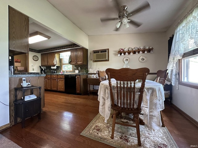 15908 Walnut St, Huntertown, IN 46748 - dining space featuring an AC wall unit, dark wood-style floors, and ceiling fan