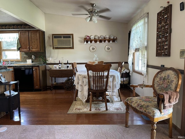 15908 Walnut St, Huntertown, IN 46748 - dining area with a wall mounted air conditioner, a ceiling fan, and dark wood-style floors