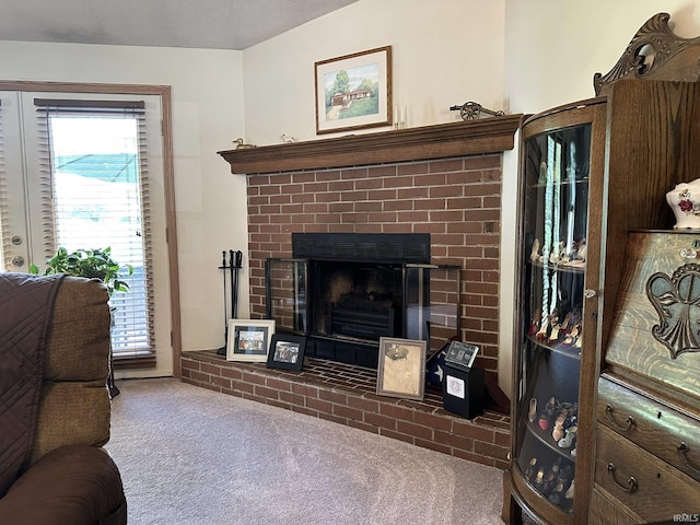 15908 Walnut St, Huntertown, IN 46748 - living room featuring carpet flooring, plenty of natural light, and a brick fireplace