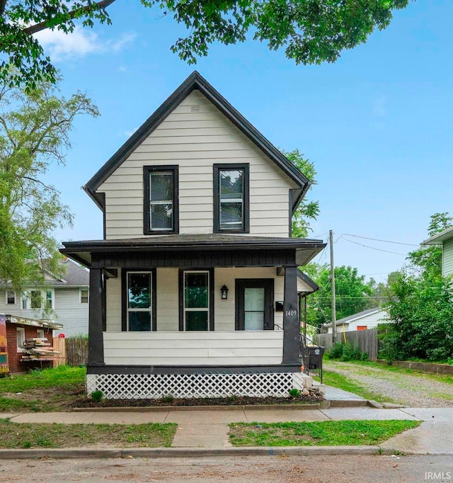 1409 Oakland St, Fort Wayne, IN 46808 - view of front of home featuring a porch