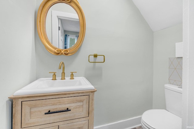 1409 Oakland St, Fort Wayne, IN 46808 - half bath featuring vanity and vaulted ceiling