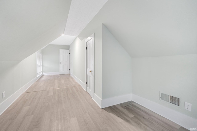 1409 Oakland St, Fort Wayne, IN 46808 - bonus room featuring vaulted ceiling and wood finished floors
