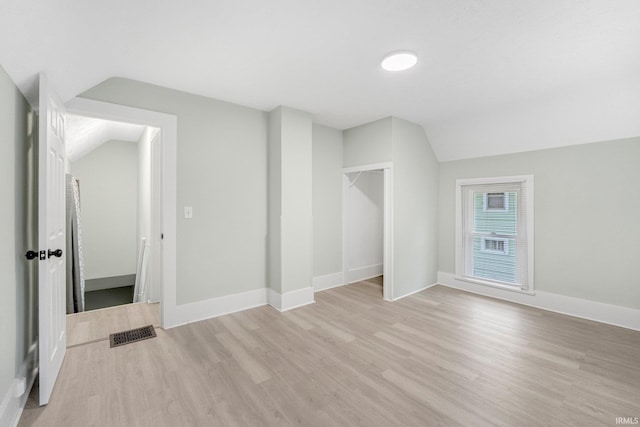 1409 Oakland St, Fort Wayne, IN 46808 - additional living space with lofted ceiling and light wood-style flooring
