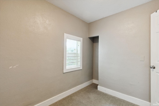 213 Riverview Ave, Elkhart, IN 46516 - carpeted spare room featuring baseboards
