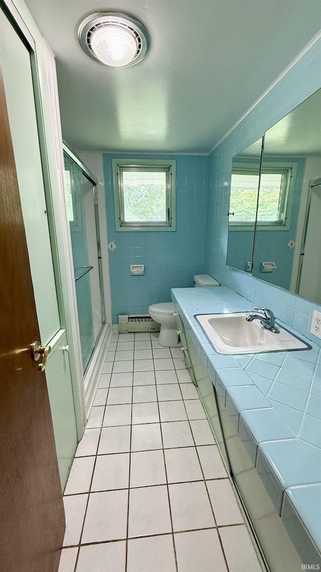 96 Greenwood Retreat Rd, Bedford, IN 47421 - full bathroom featuring baseboard heating, a stall shower, tile patterned flooring, and vanity
