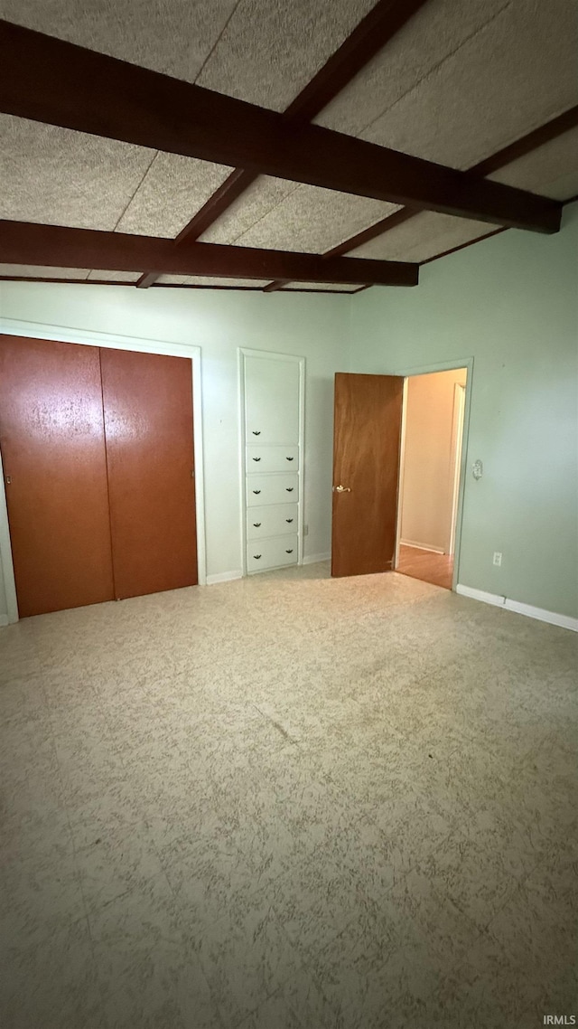 96 Greenwood Retreat Rd, Bedford, IN 47421 - unfurnished bedroom with beamed ceiling and carpet flooring