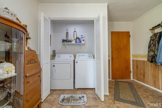401 Meadow Ln, Hartford City, IN 47348 - laundry area with separate washer and dryer, ornamental molding, and tile patterned flooring