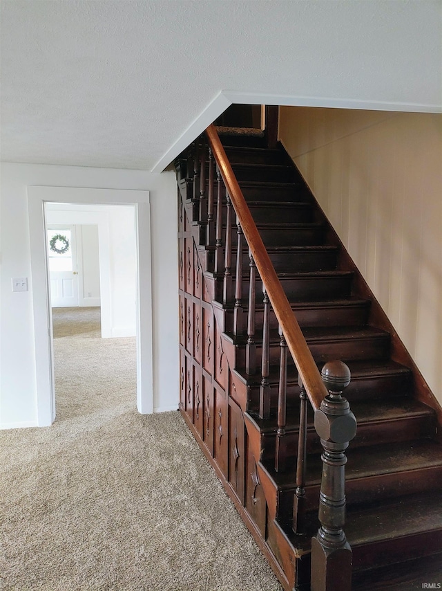 607 W 4th St, North Manchester, IN 46962 - staircase featuring carpet floors