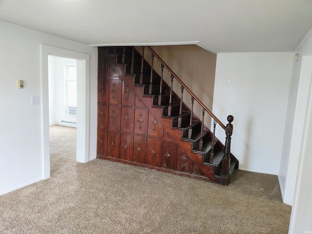 607 W 4th St, North Manchester, IN 46962 - stairway with carpet flooring and baseboard heating