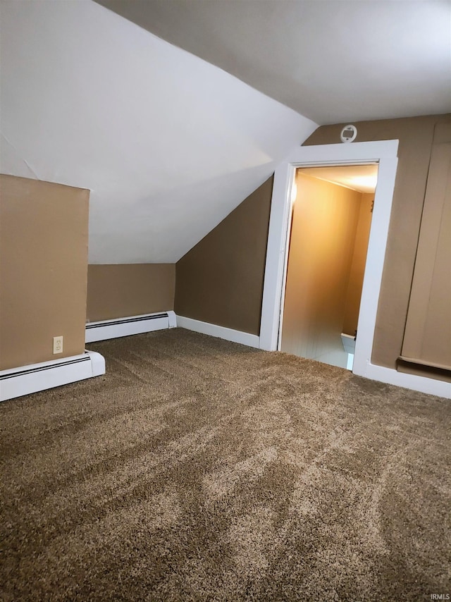 607 W 4th St, North Manchester, IN 46962 - additional living space with a baseboard heating unit, carpet, and lofted ceiling