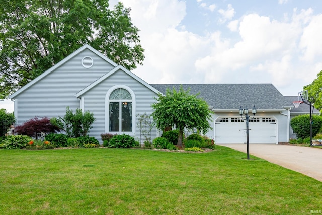 22885 Stonebrier Dr, Elkhart, IN 46514 - single story home with a garage, concrete driveway, a front lawn, and roof with shingles