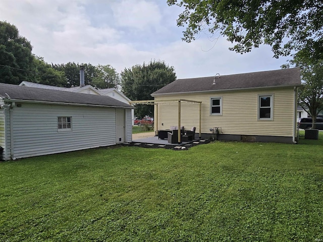 1506 Cass Ave, Evansville, IN 47714 - back of house featuring a yard and a patio area