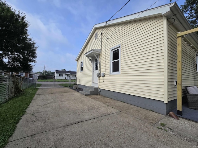 1506 Cass Ave, Evansville, IN 47714 - view of side of home with a gate, entry steps, and driveway