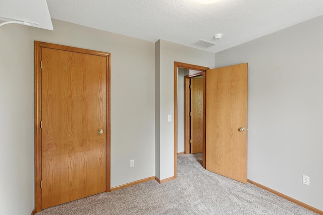 5130 Windy Knoll Ct, Fort Wayne, IN 46809 - unfurnished bedroom with carpet floors and a textured ceiling