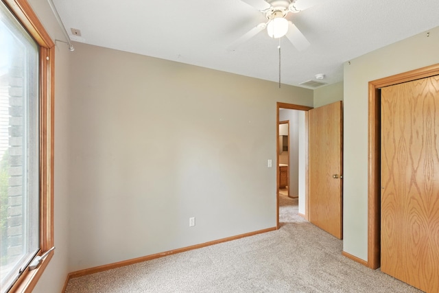 5130 Windy Knoll Ct, Fort Wayne, IN 46809 - unfurnished bedroom featuring light carpet, a closet, and ceiling fan