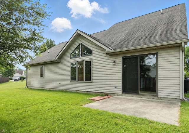 5130 Windy Knoll Ct, Fort Wayne, IN 46809 - rear view of property with roof with shingles, a patio, and a yard