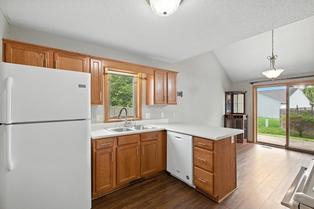 5130 Windy Knoll Ct, Fort Wayne, IN 46809 - kitchen featuring white appliances, a peninsula, dark wood-type flooring, vaulted ceiling, and light countertops