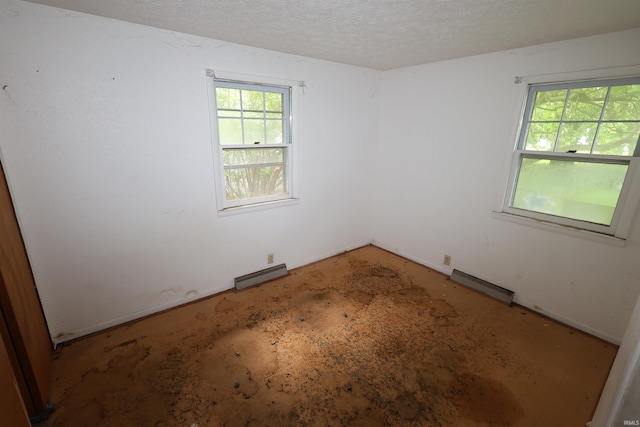 310 W Elm St, Millersburg, IN 46543 - unfurnished room with a textured ceiling