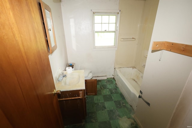 310 W Elm St, Millersburg, IN 46543 - bathroom with vanity, tile patterned floors, and a bath