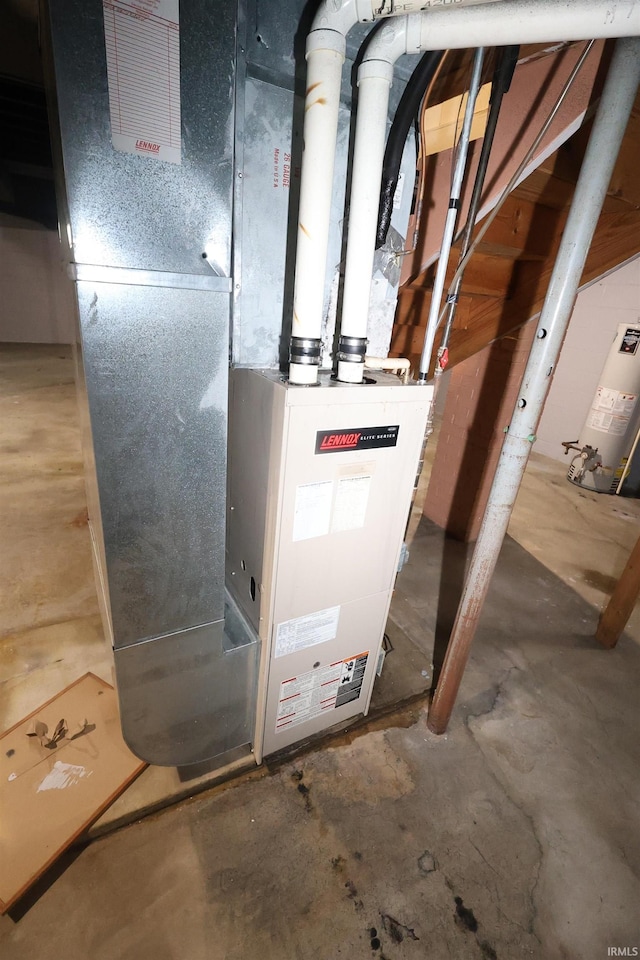 310 W Elm St, Millersburg, IN 46543 - utility room with gas water heater and heating unit