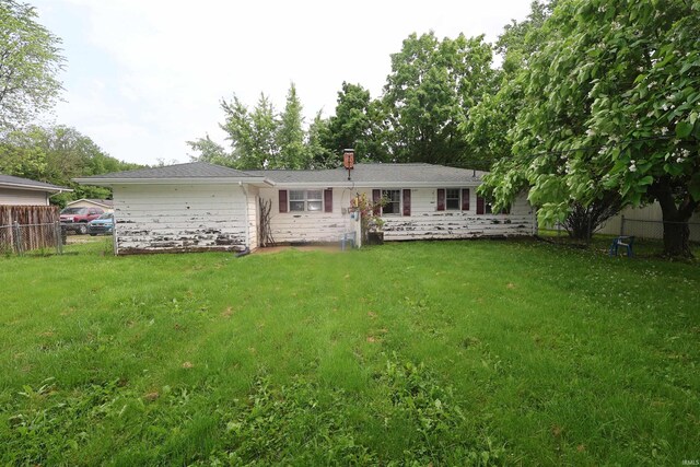 310 W Elm St, Millersburg, IN 46543 - back of house with a chimney