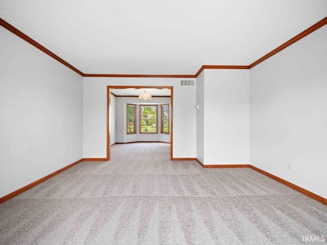 624 Diamond Point Pl, Fort Wayne, IN 46804 - empty room with light colored carpet, ornamental molding, and a chandelier
