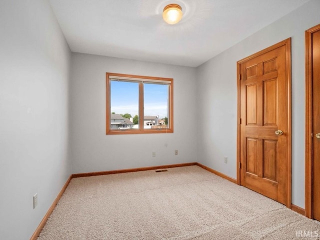 624 Diamond Point Pl, Fort Wayne, IN 46804 - unfurnished room featuring baseboards and carpet