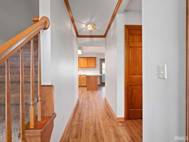 624 Diamond Point Pl, Fort Wayne, IN 46804 - hall with light wood-type flooring, crown molding, and stairs