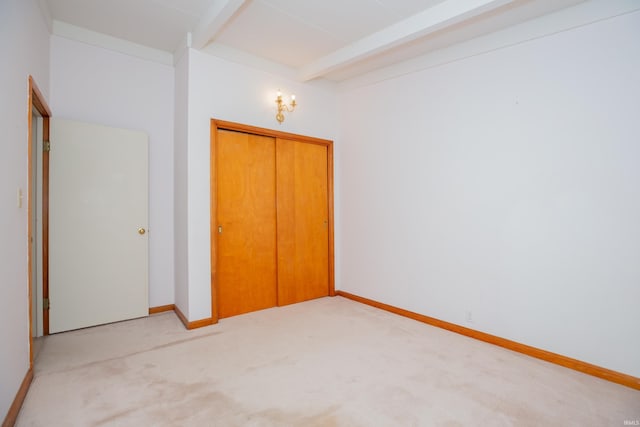 7811 Meadowview Dr, Evansville, IN 47710 - unfurnished bedroom featuring beamed ceiling and light carpet