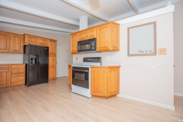 7811 Meadowview Dr, Evansville, IN 47710 - kitchen with black appliances, light wood-style floors, beam ceiling, and light countertops