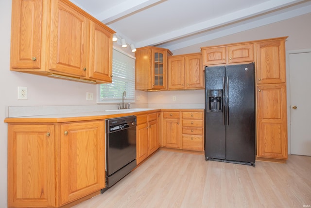 7811 Meadowview Dr, Evansville, IN 47710 - kitchen with black appliances, light countertops, light wood-style floors, and glass insert cabinets
