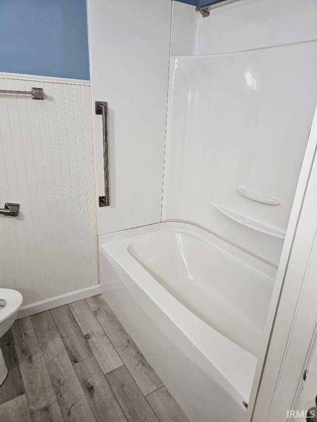 5924 S 300 E 57 Rd, Churubusco, IN 46723 - full bath featuring wood finished floors and tub / shower combination
